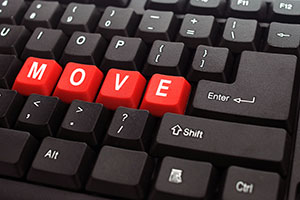 the letters MOVE highlighted on a computer keyboard