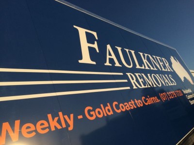 Faulkner Removals branding on the side of a truck