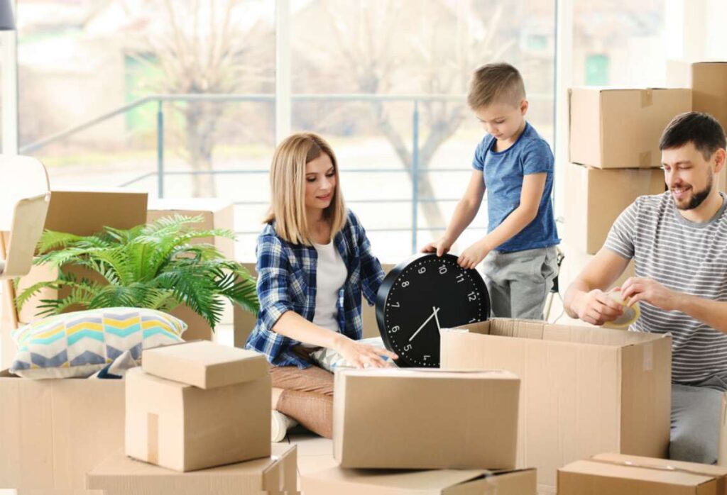 family helping each other get ready for the big move